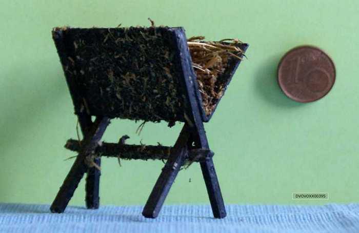 Beeldje: Houten kribbe